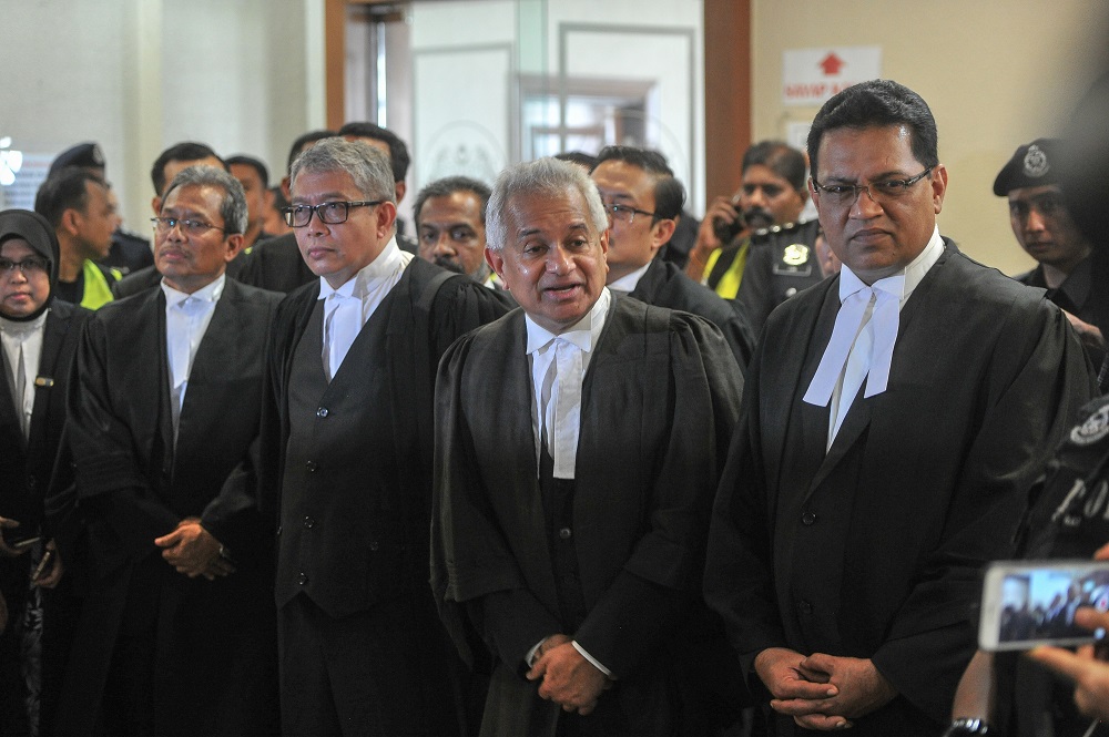 Attorney General Tommy Thomas (second right) and his deputy public prosecutors (from left) Datuk Suhaimi Ibrahim, Datuk Mohamad Haniafiah Zakaria and Manoj Kurup at a news conference in Kuala Lumpur July 4, 2018. u00e2u20acu201d Picture by Shafwan Zaidon