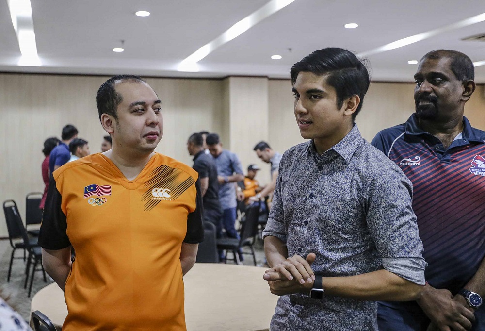 Youth and Sports Minister Syed Saddiq Syed Abdul Rahman with Olympic Council of Malaysia secretary general Mohd Nazifuddin Najib during a Hari Raya Aidilfitri celebration in Kuala Lumpur July 7, 2018. u00e2u20acu201d Picture by Firdaus Latif