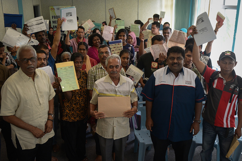 Klang MP Charles Santiago with the people came to get their citizenship rights during u00e2u20acu02dcProgram Mendaftar Anak Malaysiau00e2u20acu2122 at his office in Bandar Bukit Tinggi July 8, 2018. u00e2u20acu201d Picture by Mukhriz Hazim