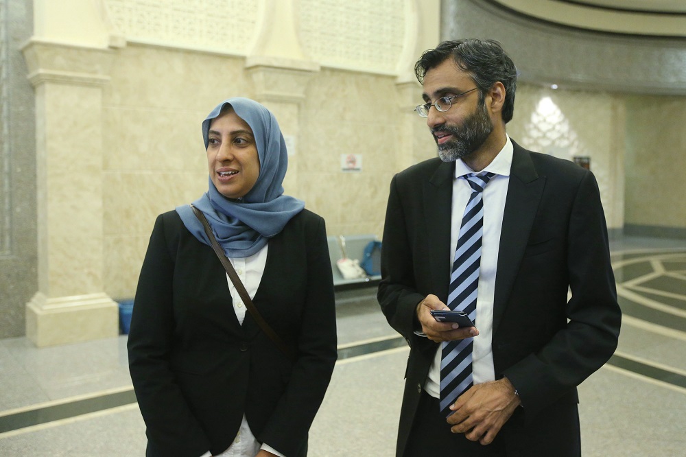 Lawyer Latheefa Koya (left), who is representing lawyer N. Surendran (right) in his constitutional challenge against the Sedition Act, speaks to reporters in Putrajaya July 13, 2018. u00e2u20acu201d  Picture by Azinuddin Ghazali