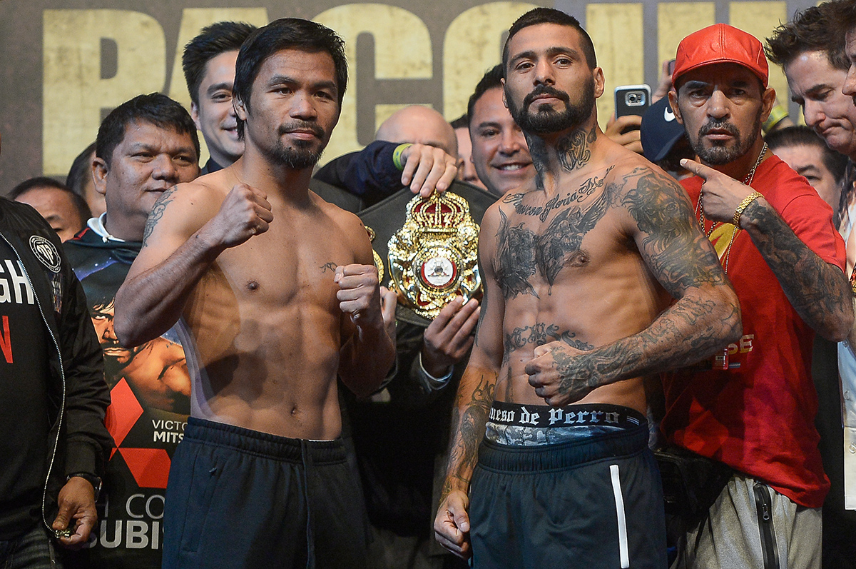 Manny Pacquiao and Lucas Matthysse at the weigh-in ahead of their world welterweight boxing championship bout in Kuala Lumpur July 14, 2018. u00e2u20acu201d Picture by Mukhriz Hazim