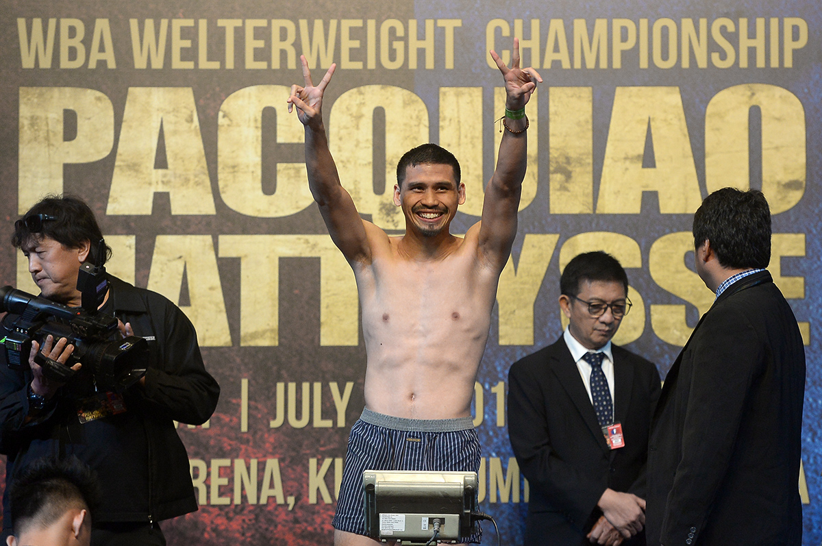 Malaysian boxer Aiman Abu Bakar at the weigh-in ahead of the world welterweight boxing championship in Kuala Lumpur July 14, 2018. u00e2u20acu201d Picture by Mukhriz Hazim