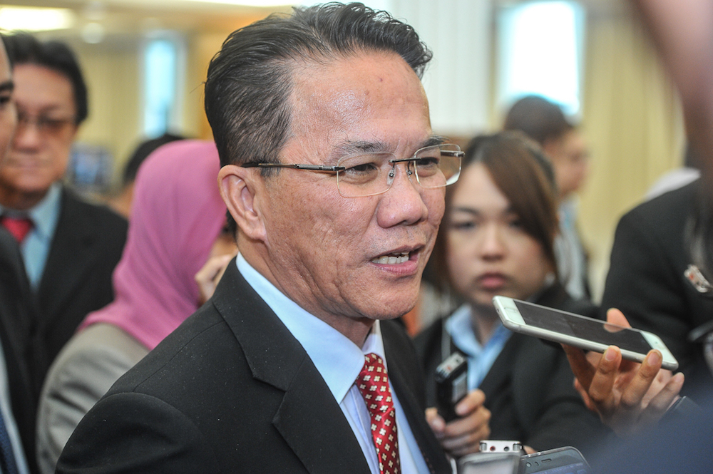 Minister in the Prime Ministeru00e2u20acu2122s Department (Legal Affairs) Datuk Liew Vui Keong speaks to the media in the lobby of Parliament in Kuala Lumpur July 19, 2018. u00e2u20acu201d Picture by Shafwan Zaidon