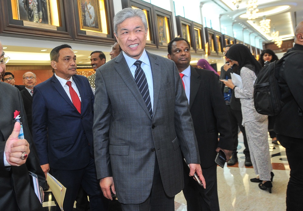 Opposition Leader Datuk Seri Ahmad Zahid Hamidi leaves during lunch break at the Parliment building in Kuala Lumpur July 19, 2018. u00e2u20acu201d Picture by Shafwan Zaidon
