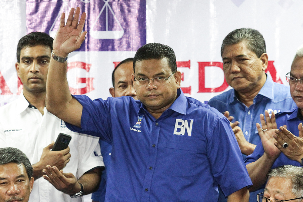 Datuk Lokman Noor Adam waves at a press conference in Shah Alam July 20, 2018. u00e2u20acu201d Picture by Miera Zulyana