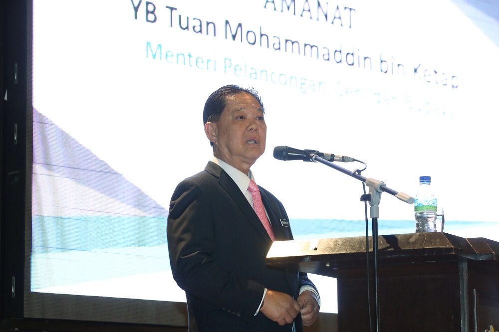 Tourism, Arts and Culture Minister Mohamaddin Ketapi delivers a speech during an assembly in Putrajaya July 20, 2018. u00e2u20acu201d Picture by Azinuddin Ghazali