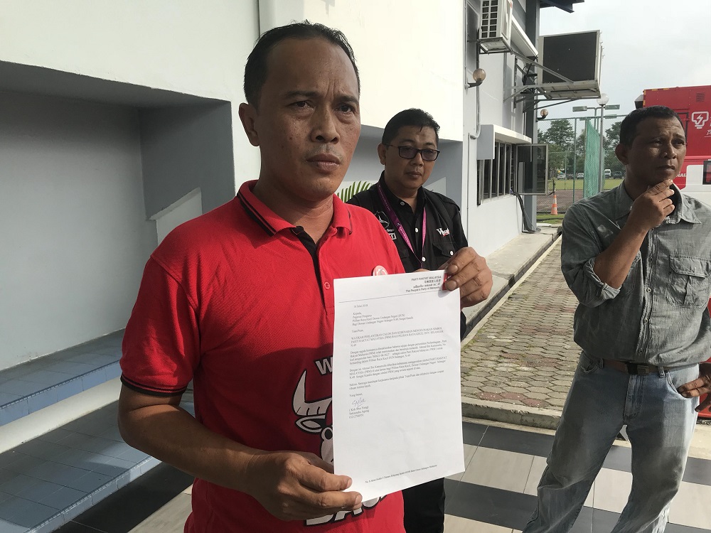 Parti Rakyat Malaysia member Ahmad Kamarudin at the Sungai Kandis nomination centre in Shah Alam July 21 2018. He left without registering as a candidate for the by-election.  u00e2u20acu201d Picture by A Ruban