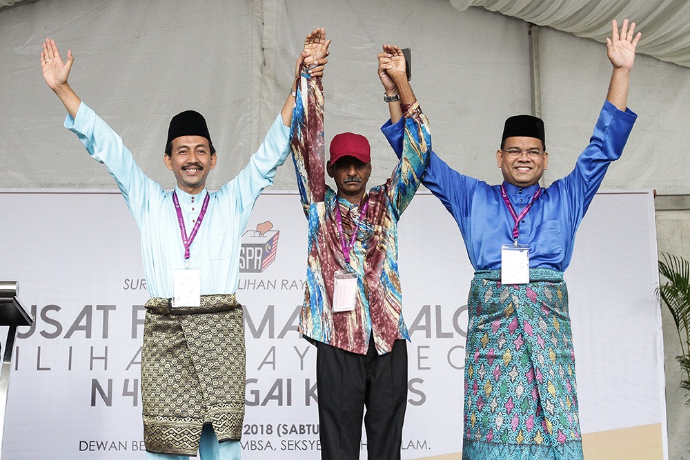 Candidates for the Sungai Kandis by-election, (from left) PKRu00e2u20acu2122s Mohd Zawawi Ahmad Mughni, independent candidate K. Murthy and BNu00e2u20acu2122s Datuk Lokman Noor Adam at the nomination centre in Shah Alam July 21, 2018. u00e2u20acu201d Picture by Miera Zulyana
