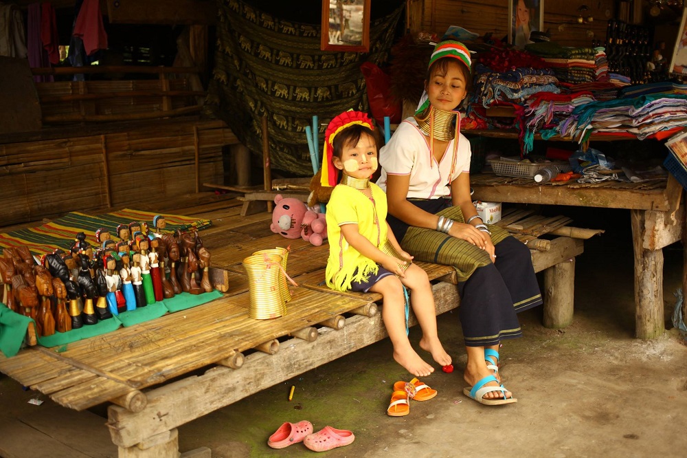 A Karen hill tribe woman and a child is seen at a village in Thailand. The Karen tribe is one of the largest hill tribes in Southeast Asia and its total population is unknown. — Picture by Hommeang Mongkorn