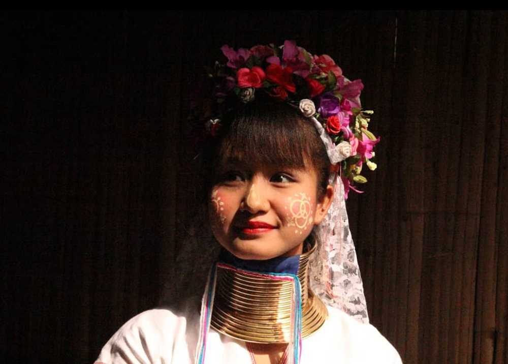 Women of the Karen long-neck tribe wears neck rings (brass coils) to to create an appearance of a stretched neck. u00e2u20acu201d Picture by Hommeang Mongkorn