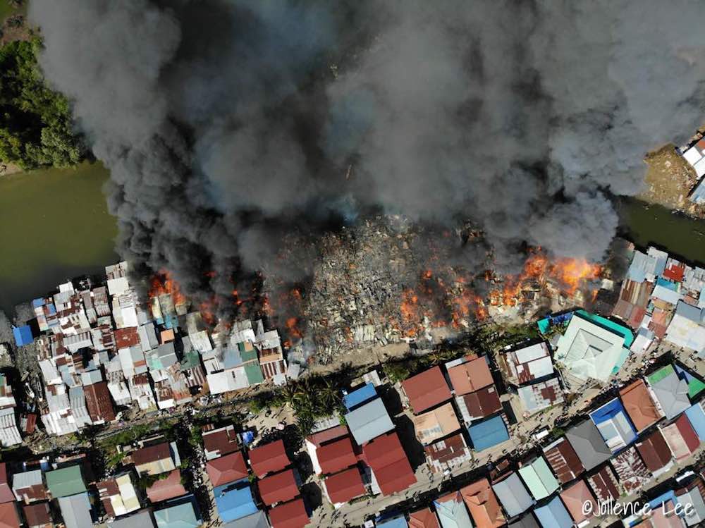 An aerial view of todayu00e2u20acu2122s fire in Likas. u00e2u20acu201d Picture by Jollence Lee