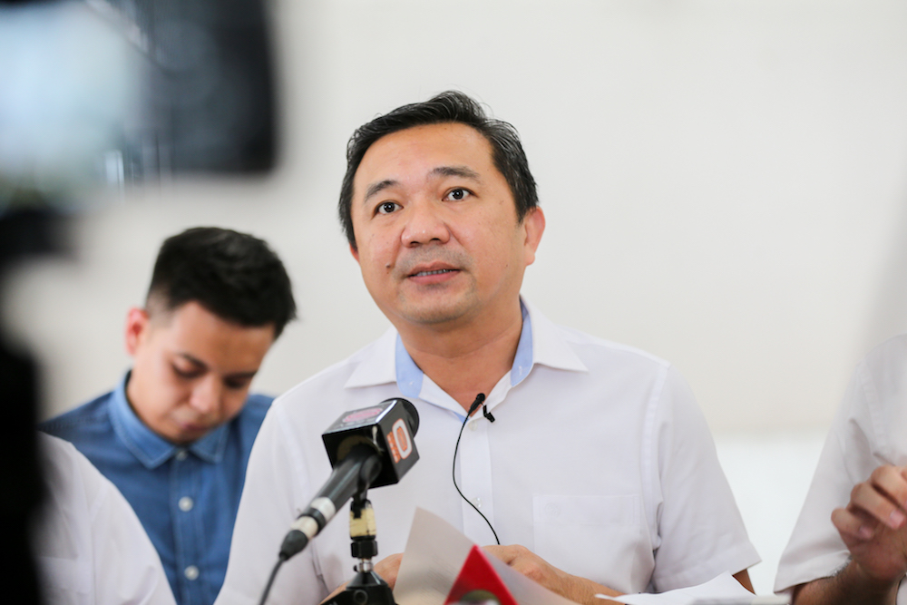 Selangor exco Ng Sze Han speaks to the media about the raids in Jenjarom July 24,2018. u00e2u20acu201d Picture by Ahmad Zamzahuri