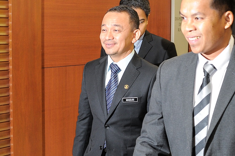 Education Minister Maszlee Malik arrives in Parliament July 26, 2018. u00e2u20acu201d Picture by Shafwan Zaidon