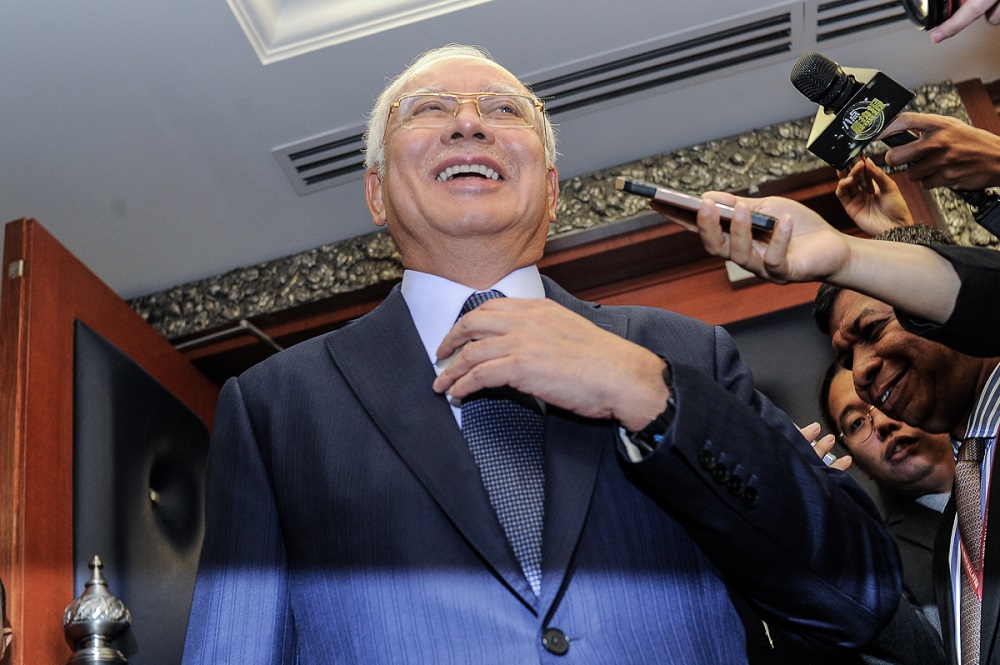 Datuk Seri Najib Razak speaks to reporters at the Parliament lobby in Kuala Lumpur July 26, 2018. u00e2u20acu201d Picture by Shafwan Zaidon
