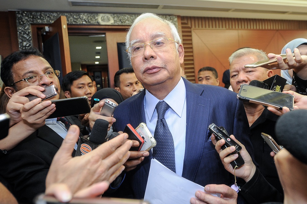 Datuk Seri Najib Razak speaks to reporters at the Parliament lobby in Kuala Lumpur July 26, 2018. u00e2u20acu201d Picture by Shafwan Zaidon