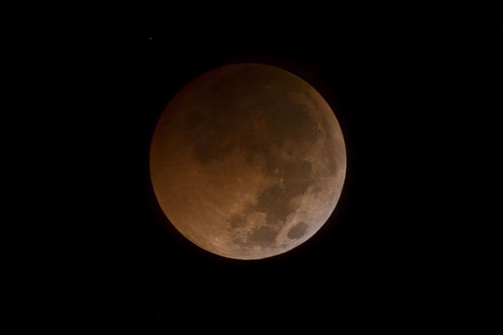 The longest u00e2u20acu02dcblood moonu00e2u20acu2122 eclipse this century is sighted in Kuala Lumpur July 28, 2018. u00e2u20acu201d Picture by Mukhriz Hazim