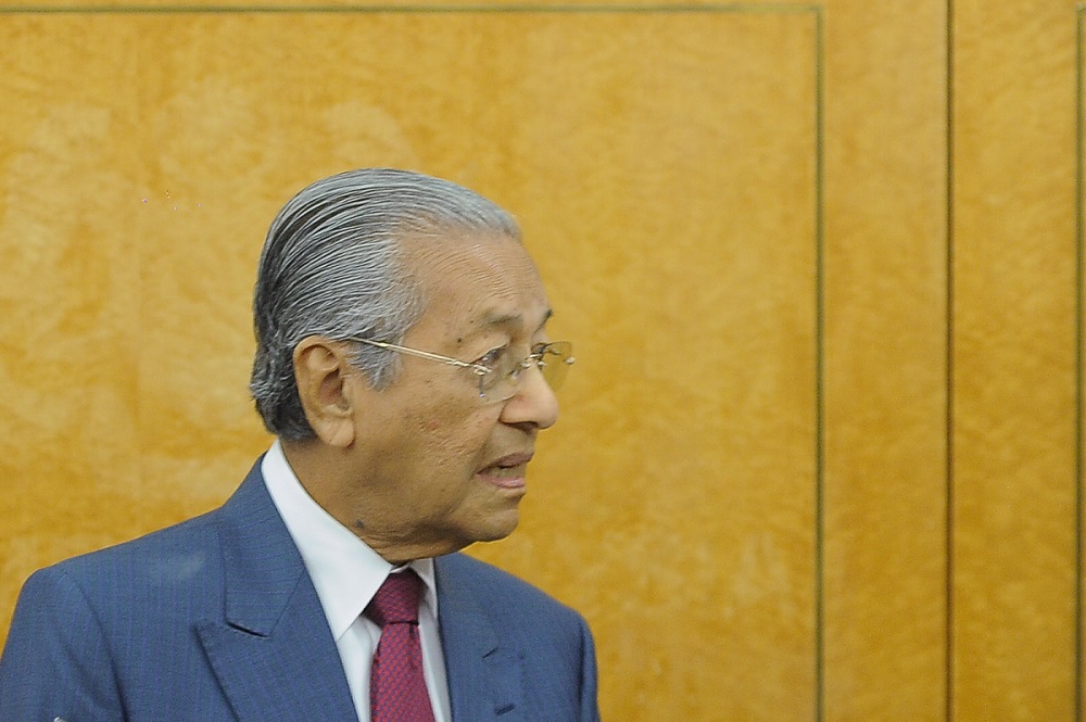 Prime Minister Tun Dr Mahathir Mohamad speaks during a press conference at the Parliament lobby in Kuala Lumpur July 30, 2018. u00e2u20acu201d Picture by Shafwan Zaidon