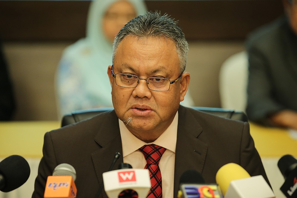 Election Commission deputy chairman Tan Sri Othman Mahmood speaks during a press conference in Putrajaya July 30, 2018. u00e2u20acu201d Picture by Miera Zulyana