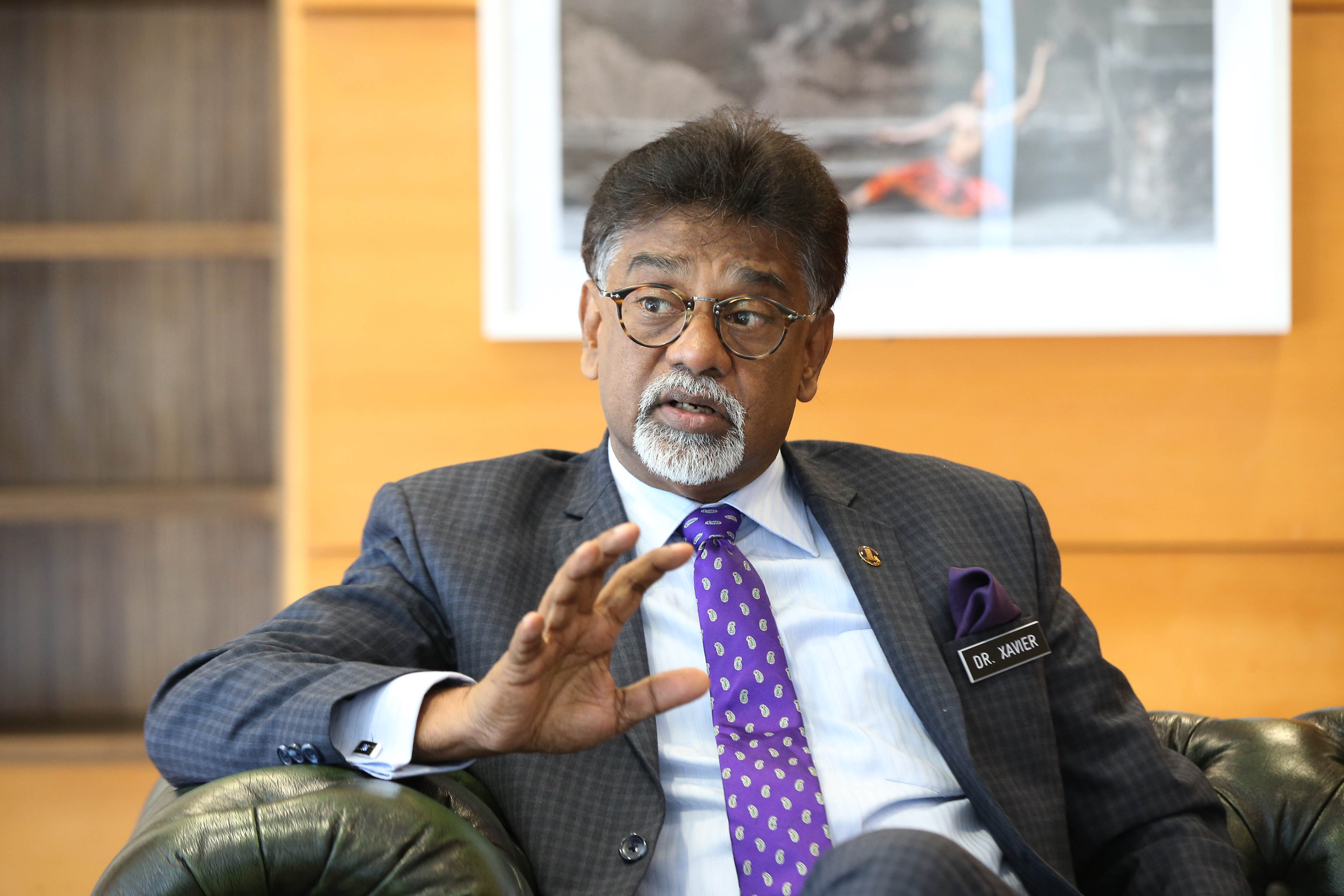 Water, Land and Natural Resources Minister Dr Xavier Jayakumar speaks to Malay Mail at his office in Putrajaya July 24, 2018. u00e2u20acu201d Picture by Azinuddin Ghazali