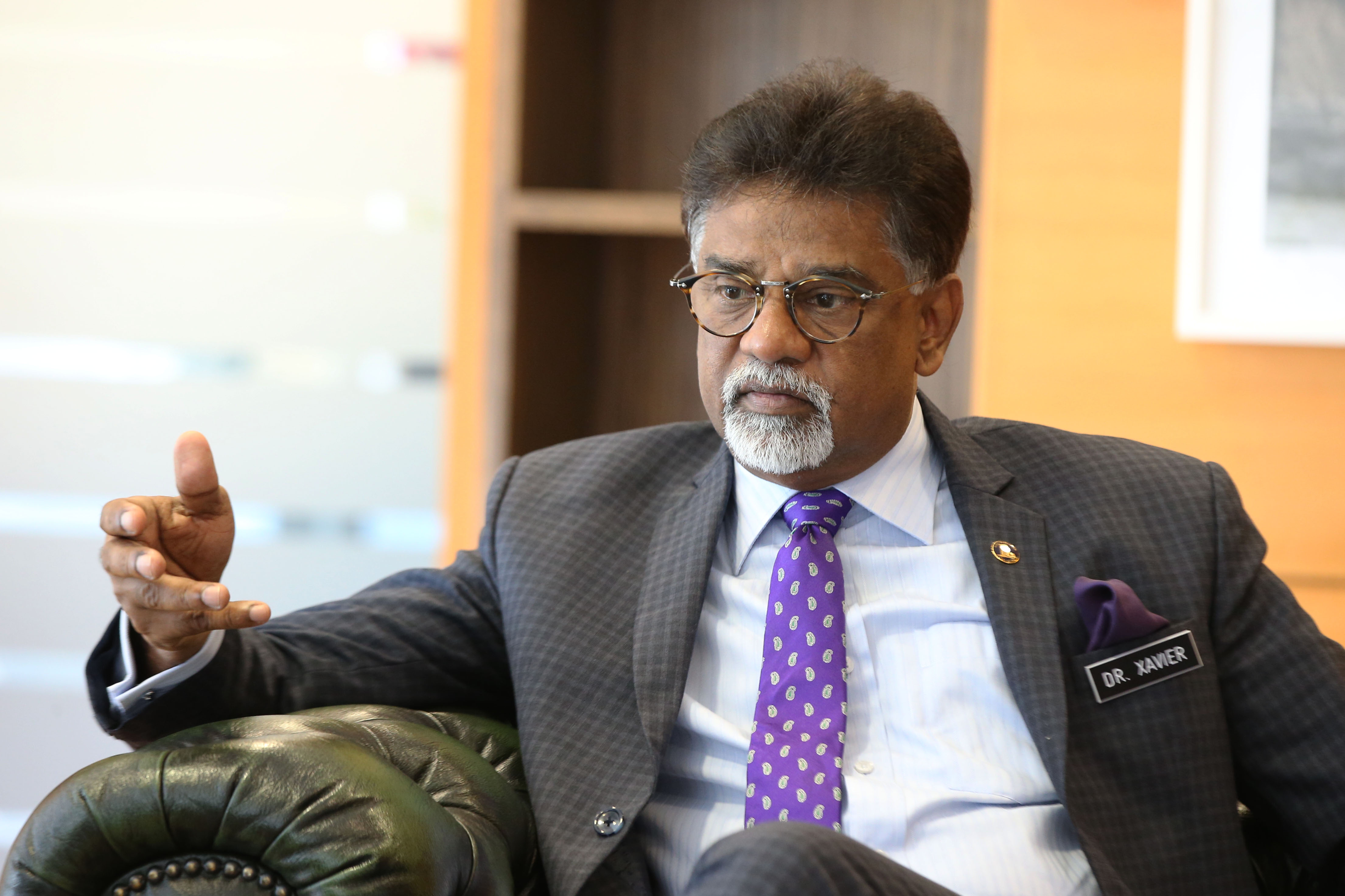 Water, Land and Natural Resources Minister Dr Xavier Jayakumar speaks to Malay Mail at his office in Putrajaya July 24, 2018. u00e2u20acu201d Picture by Azinuddin Ghazali