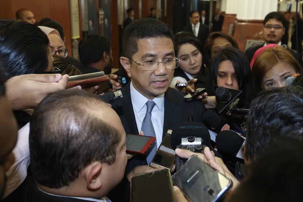 Minister of Economic Affairs Datuk Seri Azmin Ali speaks to reporters at Parliament, July 24, 2018. u00e2u20acu201d Picture by Zuraneeza Zulkifli