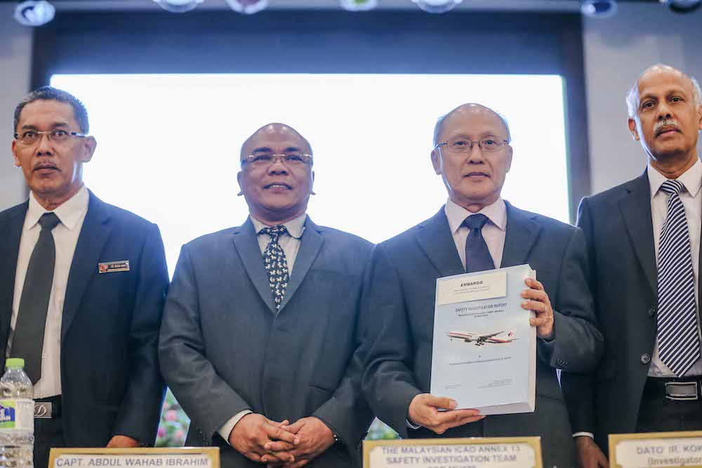 (from left) Senior Investigator Datuk Mohd Shah Mahmood, Senior Investigator Capt Abdul Wahab Ibrahim, Investigator in charge Datuk Ir Kok Soo Chon and Senior Investigator Mohan Suppiah in Putrajaya. — Picture by Firdaus Latif