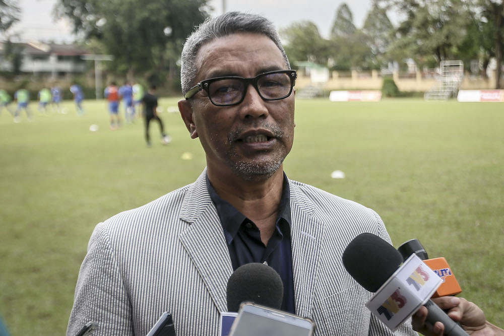 National U-23 manager Datuk Wira Mohd Yusoff Mahadi speaks to Malay Mail at Wisma FAM, Kelana Jaya July 30, 2018. u00e2u20acu201d Picture by Hari Anggara
