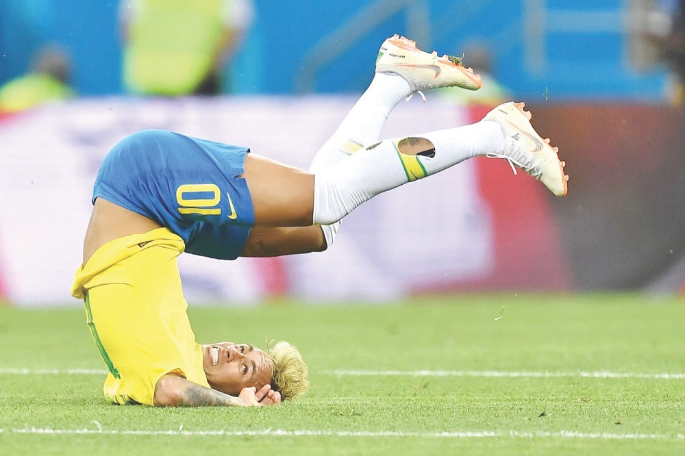 Brazilu00e2u20acu2122s forward Neymar falls during the Russia 2018 World Cup Group E football match between Brazil and Switzerland at the Rostov Arena in Rostov-On-Don June 17, 2018. u00e2u20acu201d AFP pic