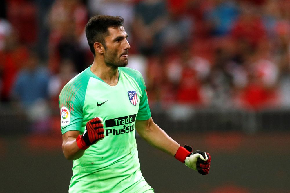 Atletico Madrid's Antonio Adan celebrates after the match against Arsenal in Singapore July 26, 2018. u00e2u20acu2022 Reuters pic