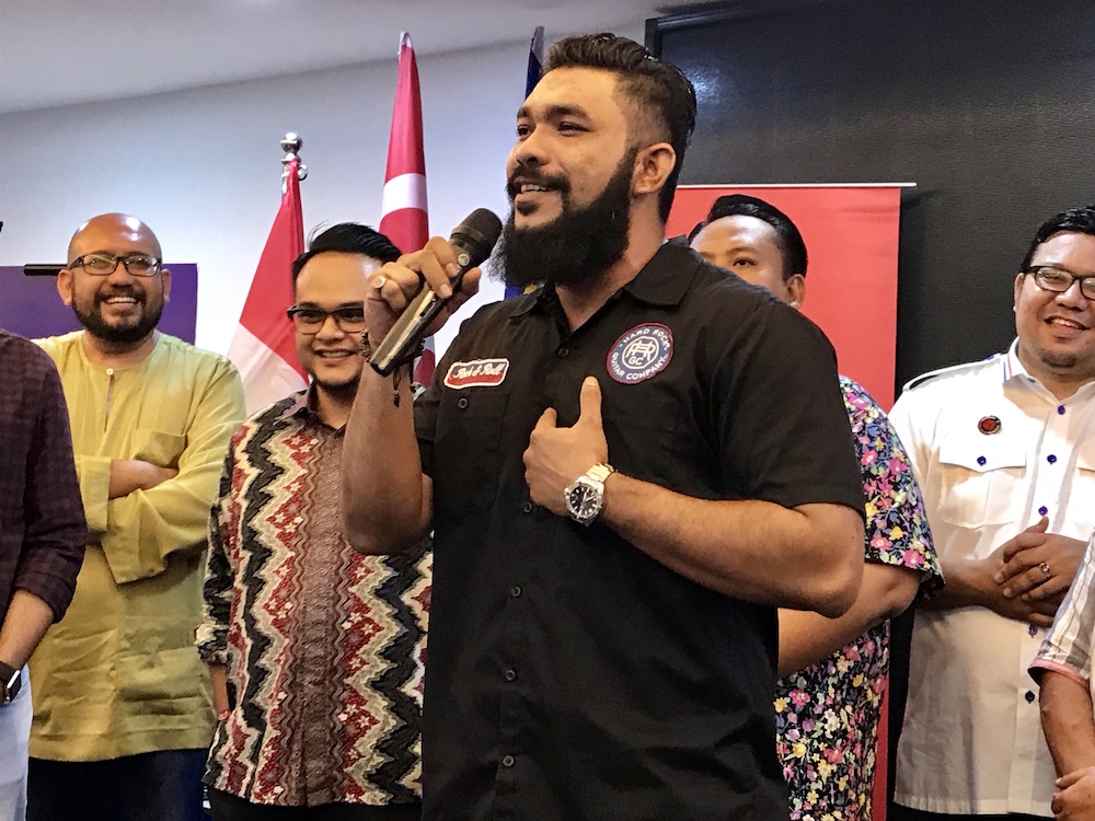 Wan Muhammad Azri Wan Deris, or more popularly known as Papagomo, came to Khairyu00e2u20acu2122s defence, describing the Opposition pactu00e2u20acu2122s walkout in Parliament yesterday as a u00e2u20acu02dccircusu00e2u20acu2122. u00e2u20acu201d Picture by Ben Tan