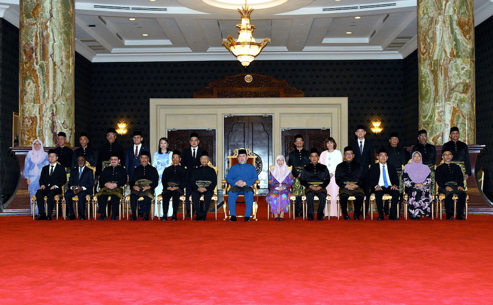 Yang di-Pertuan Agong Sultan Muhammad V takes a photo with the deputy ministers who were sworn in at Istana Negara in Kuala Lumpur July 2, 2018. u00e2u20acu201d Bernama pic