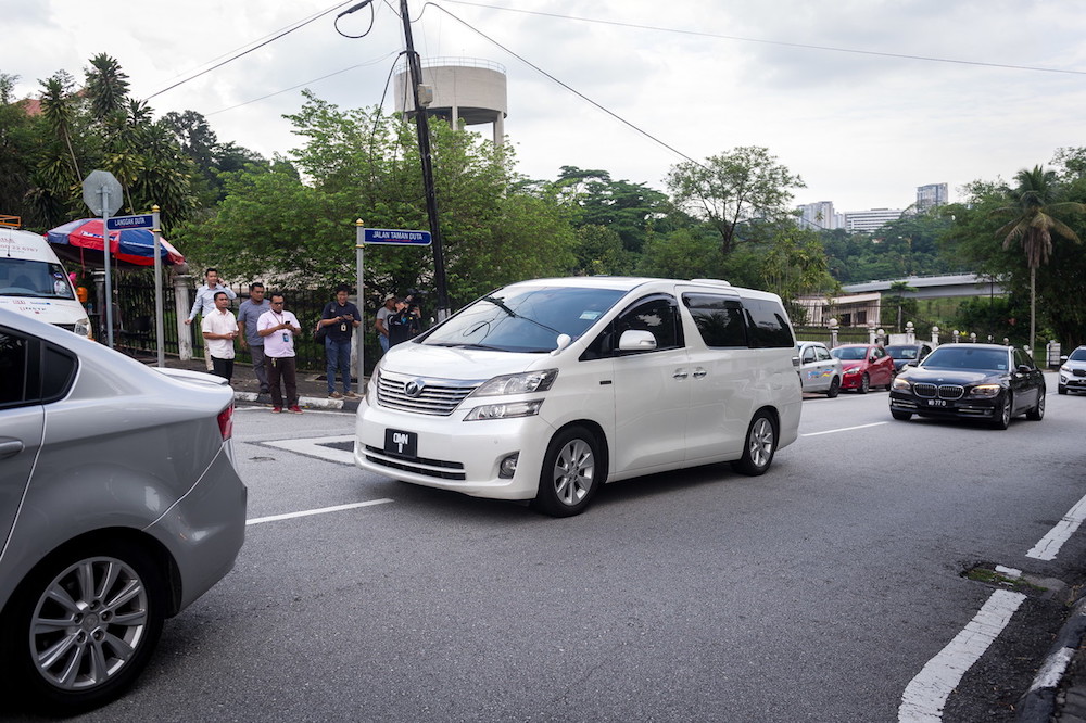 Datuk Seri Najib Razak and Datin Seri Rosmah Mansor travel home in their white Toyota Alphard Vellfire after his court appearance in Kuala Lumpur July 4, 2018. u00e2u20acu201d Bernama pic