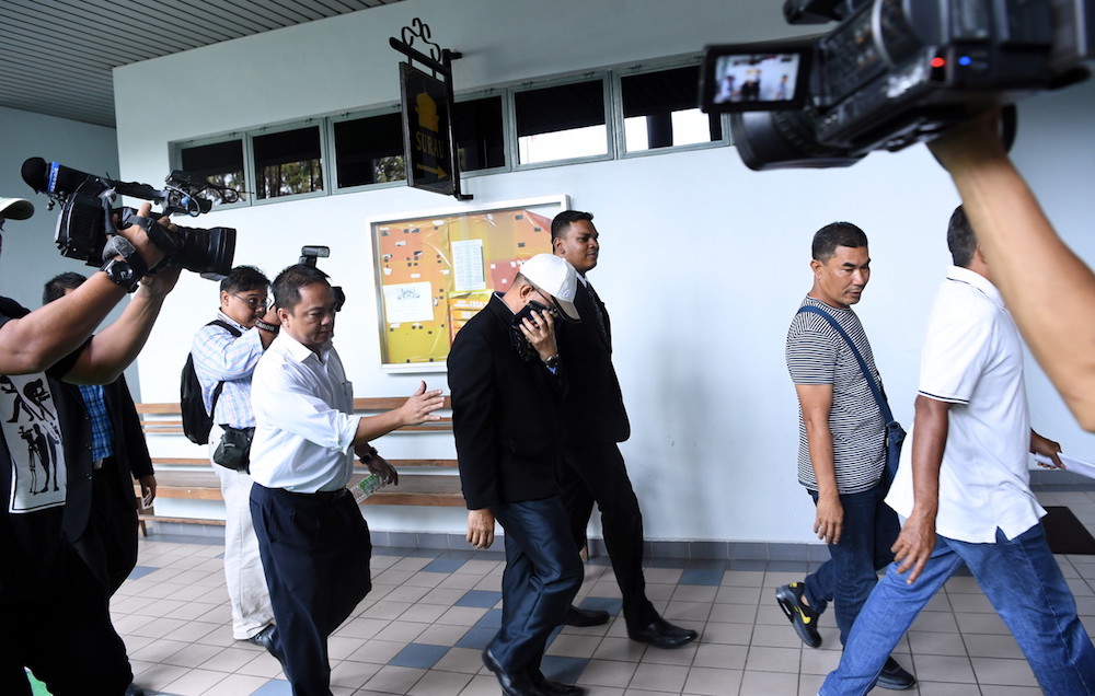 Datuk Khalid Omar arrives at the Sessions Court in Melaka July 5, 2018. u00e2u20acu201d Bernama pic