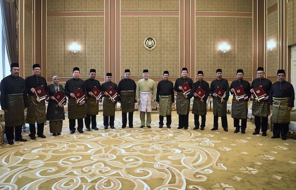 Yang di-Pertuan Agong Sultan Muhammad V and Foreign Affairs Minister Datuk Saifuddin Abdullah pose for photos with the new heads of mission at Istana Negara in Kuala Lumpur July 5, 2018. u00e2u20acu201d Bernama pic