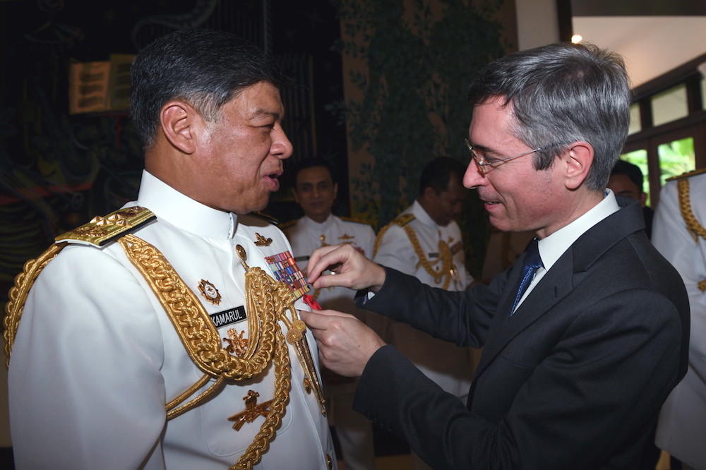 Royal Malaysian Navy chief Admiral Tan Sri Ahmad Kamarulzaman Ahmad Badaruddin is conferred the Officier de la Legion du00e2u20acu2122Honneur by French Ambassador to Malaysia, Frederic Laplanche, in Kuala Lumpur July 24, 2018. u00e2u20acu201d Bernama pic