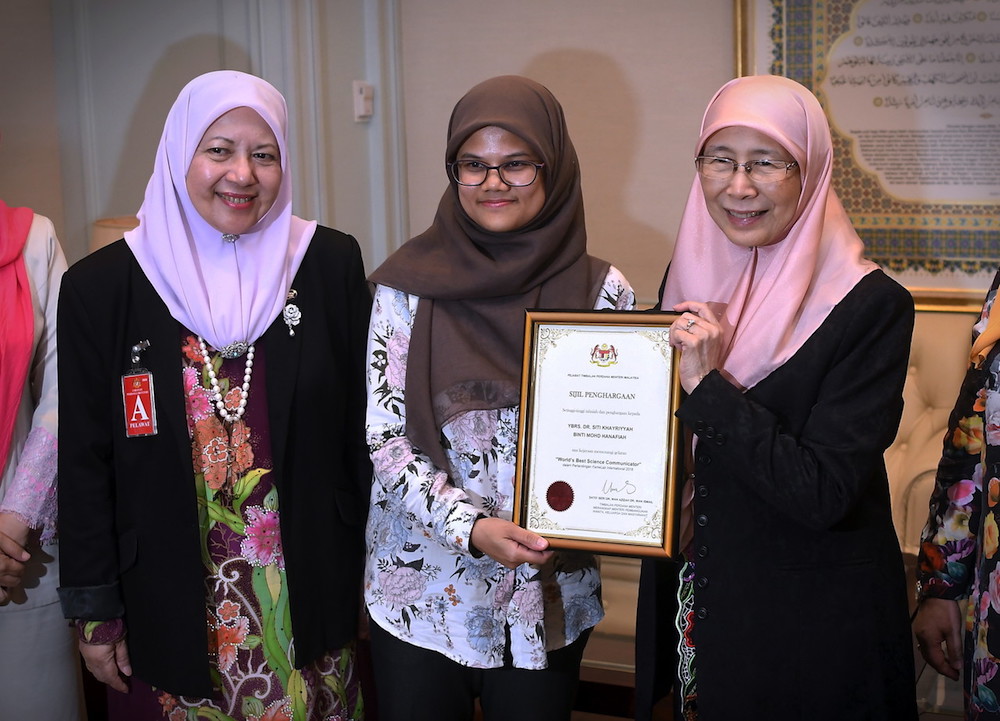 From left): Prof Datuk Asma Ismail, Siti Khayriyyah Mohd Hanafiah and Datuk Seri Dr Wan Azizah Wan Ismail pose for pictures in Putrajaya July 24, 2018. u00e2u20acu201d Bernama pic