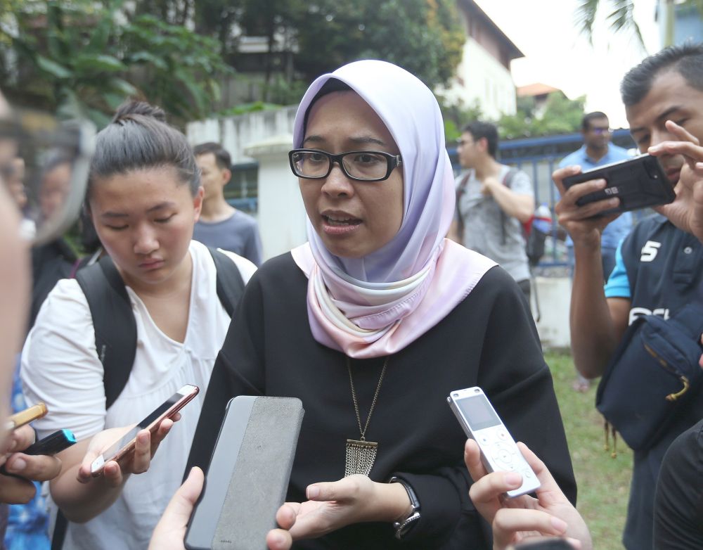Fadiah Nadwa Fikri speaks to reporters outside IPD Brickfields July 11, 2018. u00e2u20acu201d Picture by Razak Ghazali