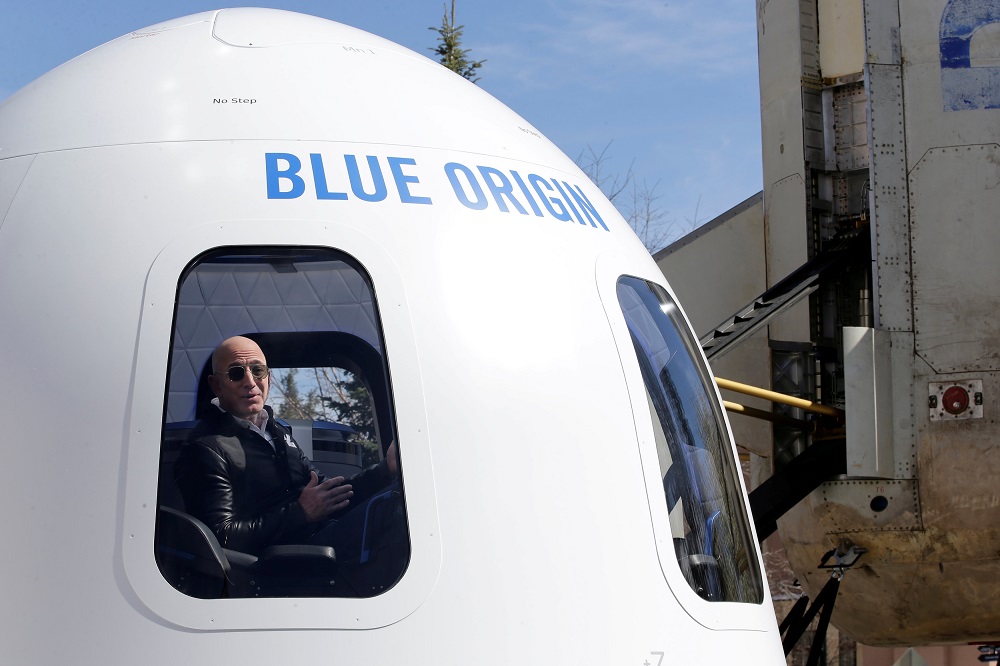 Amazon and Blue Origin founder Jeff Bezos addresses the media about the New Shepard rocket booster and Crew Capsule mockup at the 33rd Space Symposium in Colorado Springs, Colorado April 5, 2017. u00e2u20acu201d Reuters pic