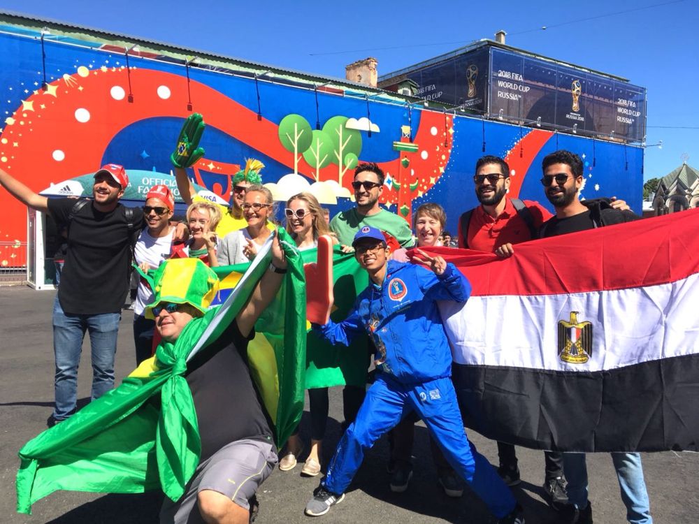 Khairul (in blue) poses with Brazilian and Egyptian fans. u00e2u20acu201d Picture courtesy of Khairul Fahmy Khairuddin