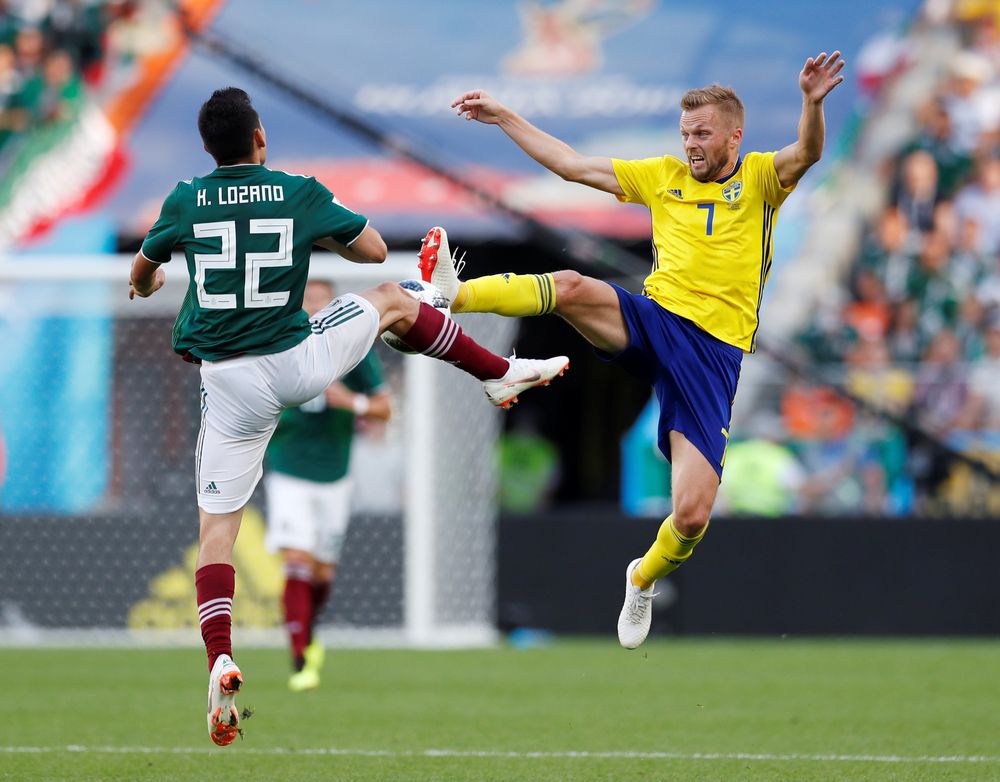 Swedenu00e2u20acu2122s Sebastian Larsson in action with Mexicou00e2u20acu2122s Hirving Lozano during their World Cup Group F match at Ekaterinburg Arena, Yekaterinburg, Russia u00e2u20acu201c June 27, 2018. u00e2u20acu201d Reuters pic