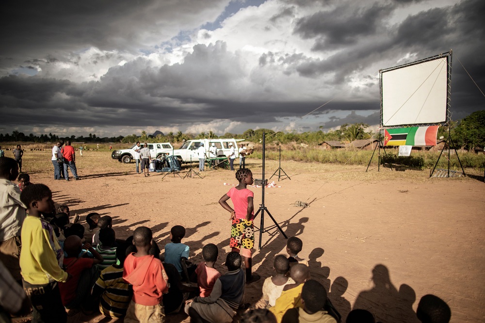 Residents of Mozambique village Alua look at a giant screen being set up ahead of watching a live broadcasting of the Football World Cup in Alua, Mozambique July 6, 2018. u00e2u20acu201d AFP pic 