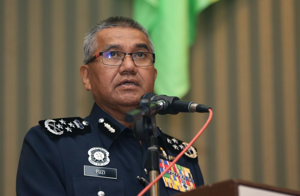 IGP Tan Sri Mohamad Fuzi Harun delivers a speech during the launch of IKoperasi in Kuala Lumpur July 10, 2018. u00e2u20acu201d Picture by Miera Zulyana