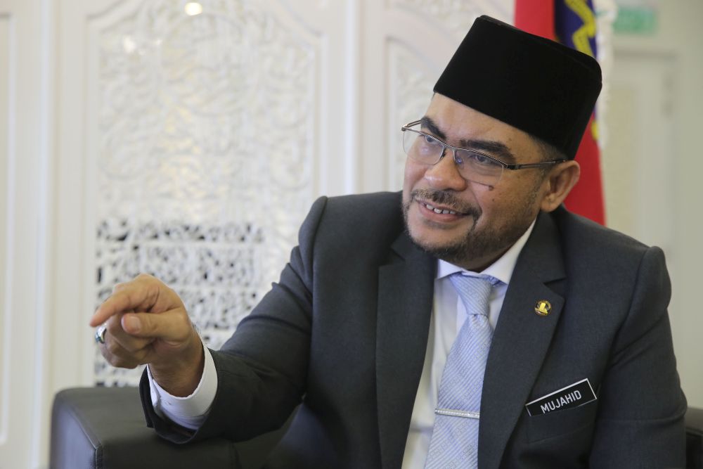 Minister in the Prime Minister's Department, Datuk Mujahid Yusof Rawa speaks to Malay Mail during an interview at his office in Putrajaya July 05, 2018. u00e2u20acu201d Picture by Yusof Mat Isa