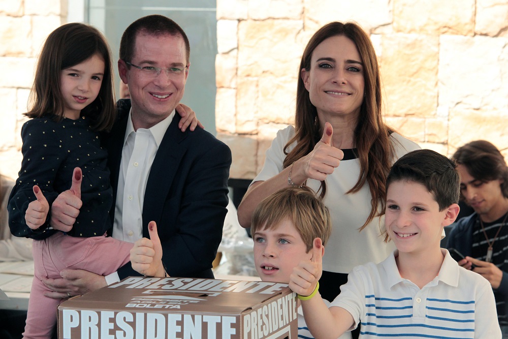 Presidential candidate Ricardo Anaya, accompanied by his wife Carolina Martinez and children Carmen, Mateo and Santiago, show their inked-stained thumbs after casting his vote during presidential election in Queretaro, Mexico July 1, 2018. u00e2u20acu201d Reuters pic