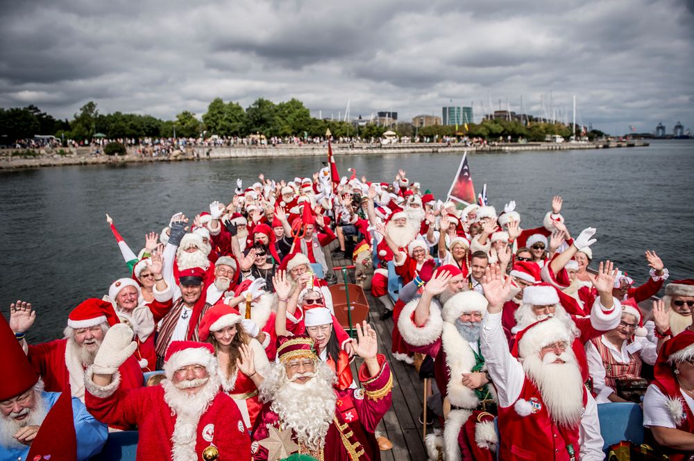 People dressed as Santa Claus take part in the World Santa Claus Congress, an annual event held every summer in Copenhagen, Denmark, July 23, 2018. u00e2u20acu201d Ritzau Scanpix/Mads Claus Rasmussen picture via Reuters