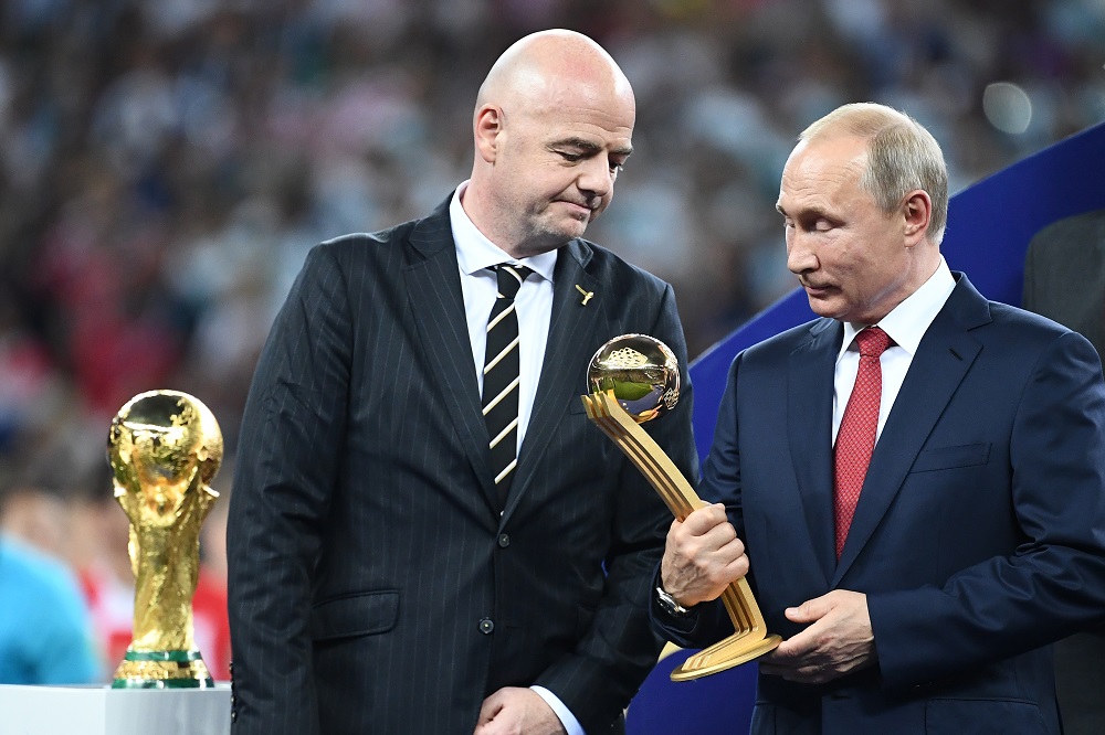 Russian President Vladimir Putin holds the adidas Golden Ball prize beside Fifa president Gianni Infantino (during the trophy ceremony at the end of the Russia 2018 World Cup final football, July 15, 2018. u00e2u20acu201d AFP pic