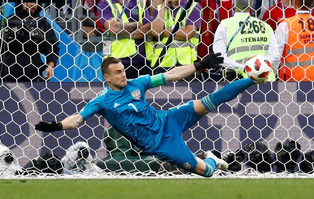 Russia's Igor Akinfeev saves a penalty from Spain's Iago Aspas during the  World Cup Round of 16 match penalty shootout in Moscow July 1, 2018. u00e2u20acu201d Reuters pic 