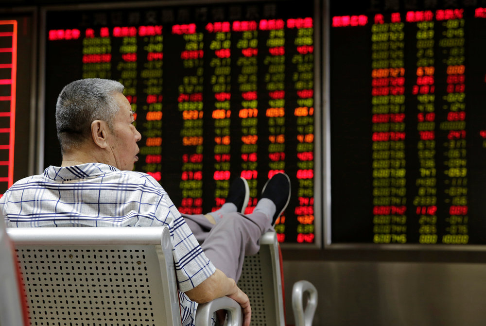 An investor watches stock prices at a brokerage office in Beijing, China July 6, 2018. u00e2u20acu201d Reuters pic