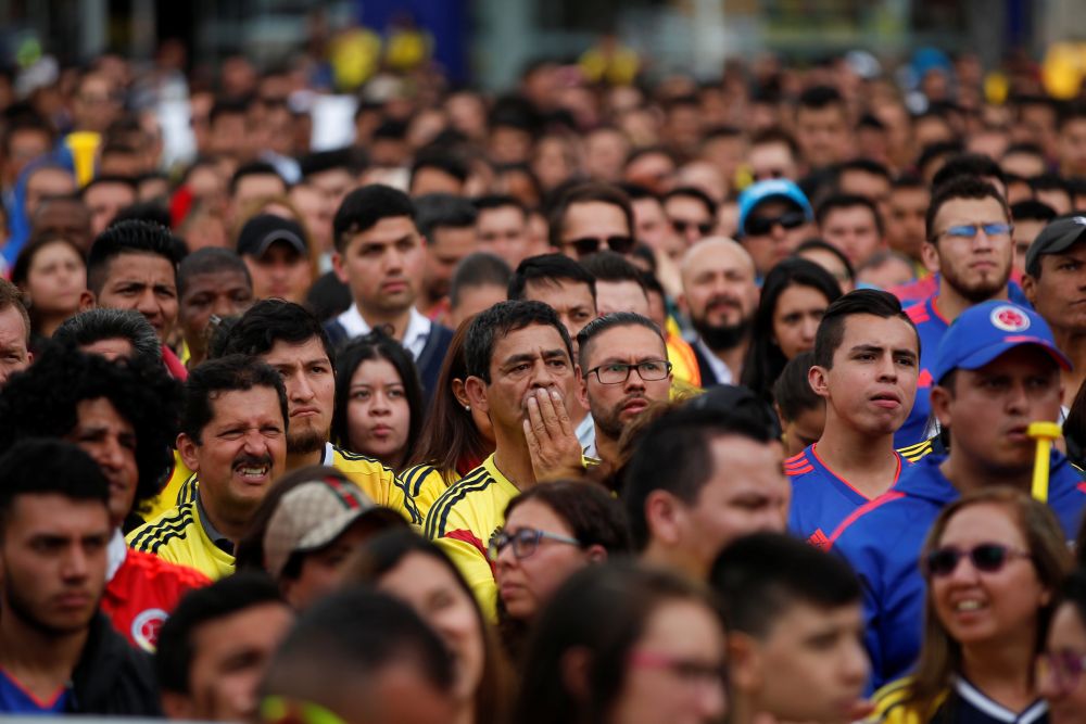 Colombian fans watch the broadcast of the World Cup Round of 16 match between Colombia and England in Bogota July 4, 2018. u00e2u20acu2022 Reuters pic