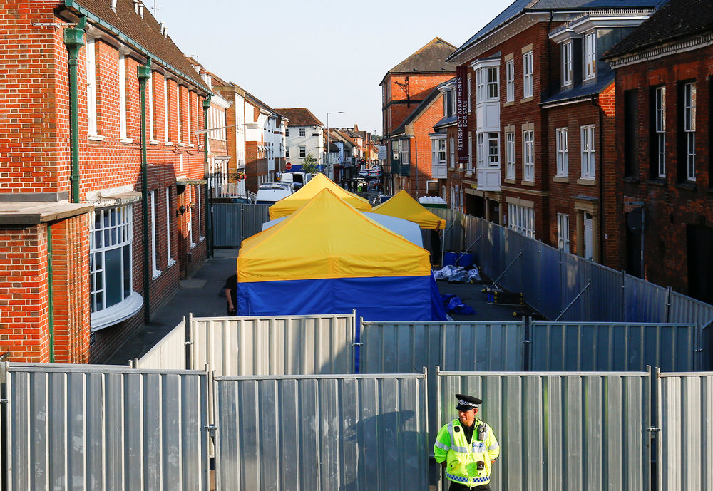A police officer in front of screening erected behind John Baker House as forensic tents are erected, after it was confirmed that two people had been poisoned with Novichok, in Amesbury, Britain July 5, 2018. u00e2u20acu201d Reuters pic 